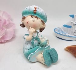  9cmx6cmx4,5cm-es tndri, knykl, kinyjtott lbbal l, matrz ruhs lny